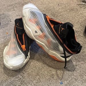 Jordan White and Orange Mesh Sneakers